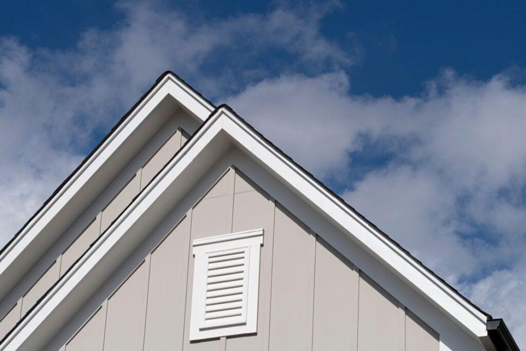 Side of a house showing the attic vent